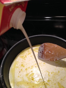 once the garlic is slightly browned poor the heavy cream into the pan.